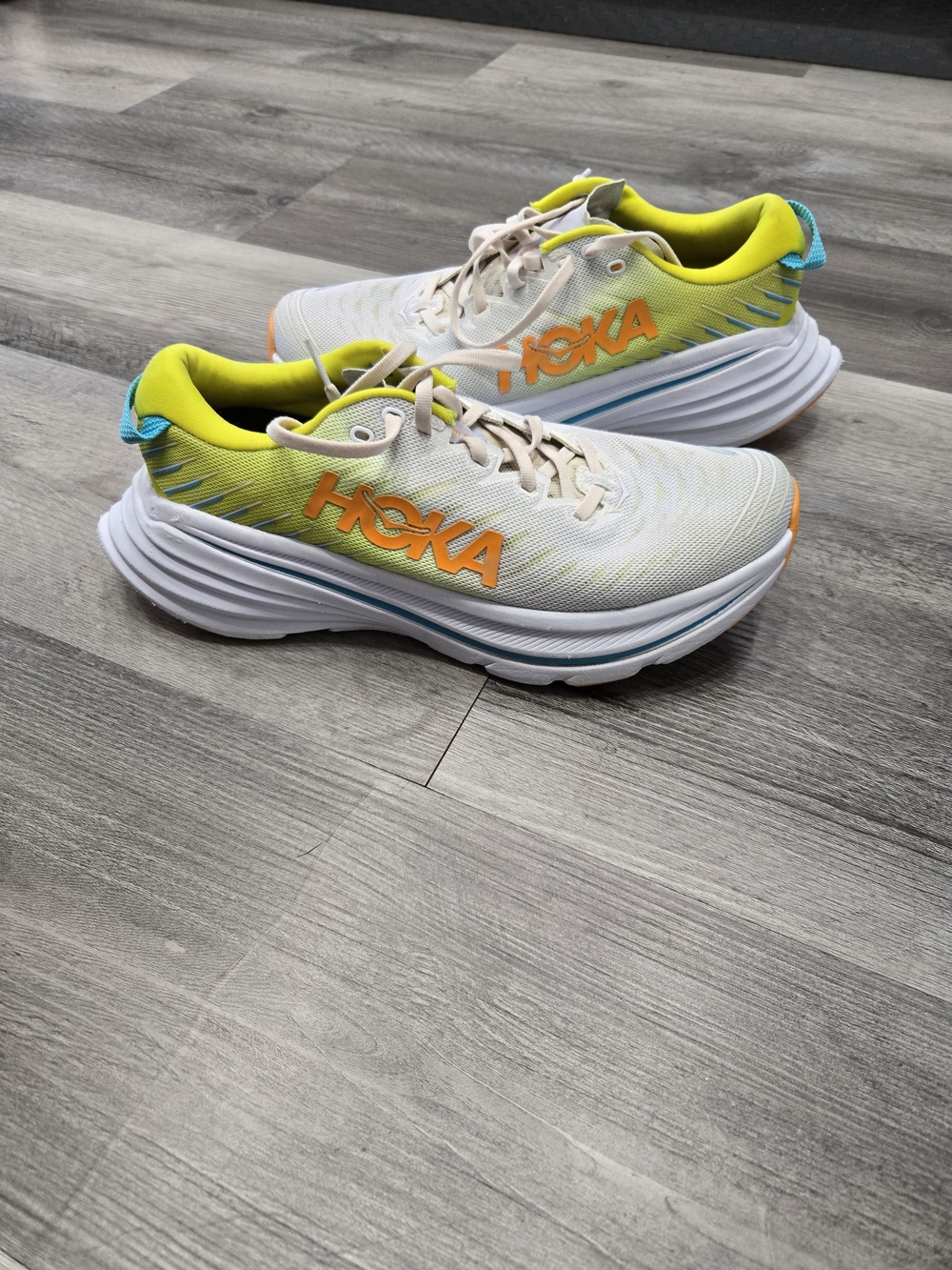 HOKA Bondi X running shoes in the White / Evening Primrose colorway